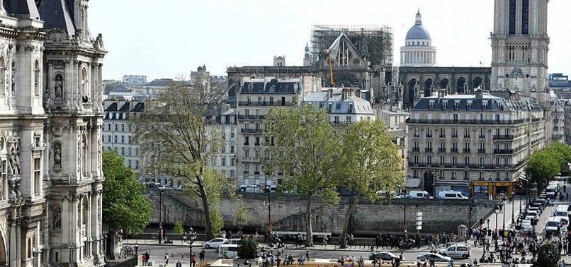 DEBATE OVER FUTURE NOTRE-DAME SPIRE FUELS FRENCH DIVISIONS