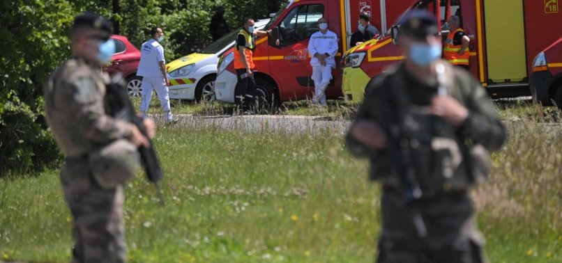 MAN KILLED AFTER STABBING, SHOOTING 3 FRENCH POLICE OFFICERS