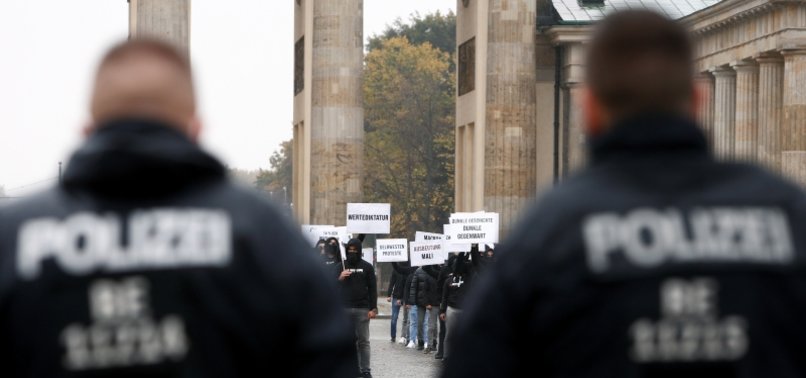 THOUSANDS PROTEST RESTRICTIONS AS GERMANY POSTS RECORD VIRUS NUMBERS