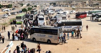 4th convoy of evacuees from Daraa arrives in Idlib