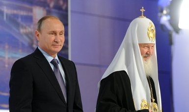 Russia's Orthodox leader urges 'unity,' says supports Putin