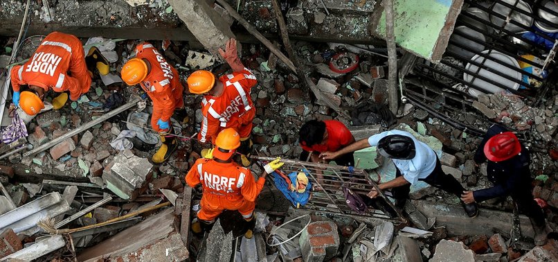 AT LEAST 13 DEAD IN RESIDENTIAL BUILDING COLLAPSE IN INDIA