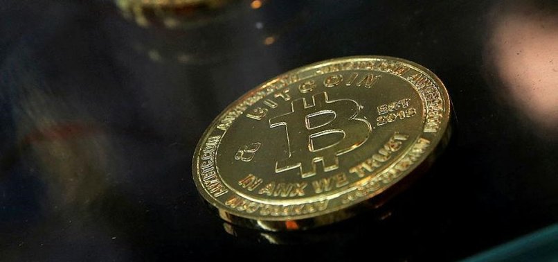BITCOIN DOWN 9 PERCENT, HITTING ONE-MONTH LOW
