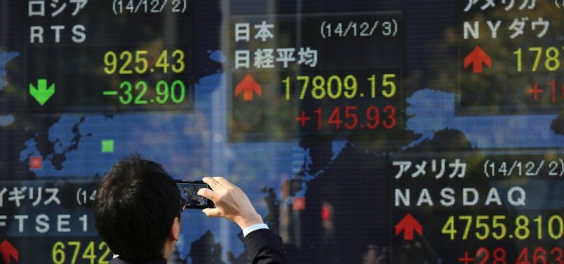 TOKYO STOCKS POST RECORD LOSSES