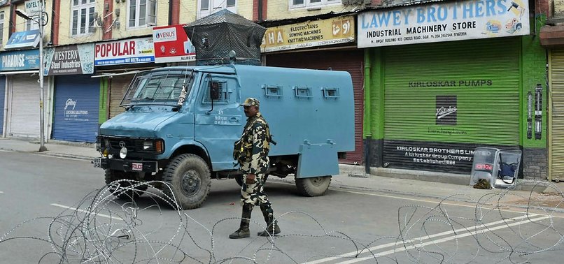 INDIA URGED TO EASE RESTRICTIONS IN KASHMIR