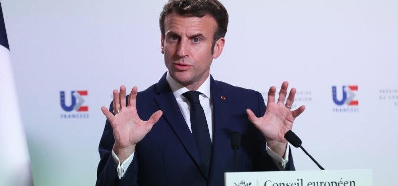 MACRON DISMISSES PUTIN DEMAND FOR GAS PAYMENTS IN RUBLES