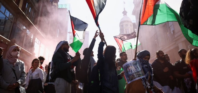 THOUSANDS OF PRO-PALESTINIAN PROTESTERS TAKE TO LONDON AND MADRID STREETS TO CONDEMN DEADLY ISRAELI AIR RAIDS ON GAZA STRIP