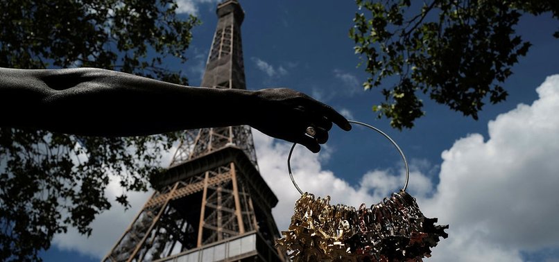 EIFFEL TOWER TO REOPEN AFTER LONGEST CLOSURE SINCE WWII