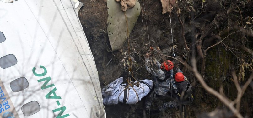 NEPAL PLANE CRASH SEARCHERS RAPPEL, FLY DRONES TO FIND LAST TWO PEOPLE