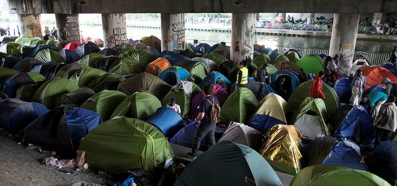 FRENCH POLICE CLOSE MIGRANT CAMP IN CENTRAL PARIS