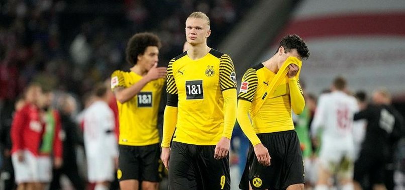 BORUSSIA DORTMUND LOSE GROUND IN TITLE RACE WITH DRAW AT COLOGNE