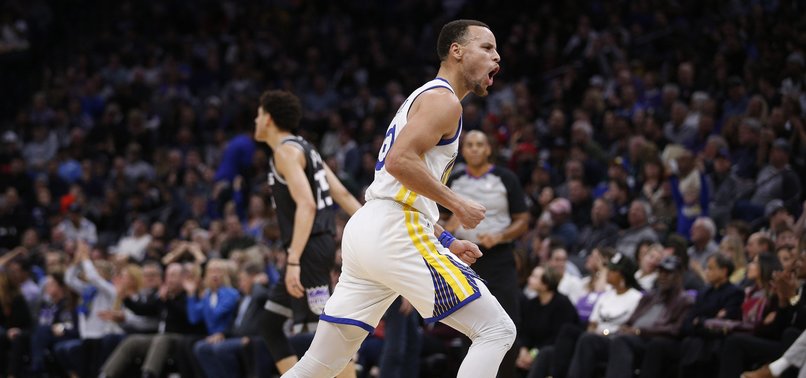 CURRY SCORES 42 POINTS, WARRIORS HOLD OFF KINGS 127-123