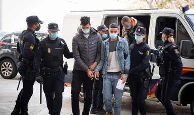 Spanish judge jails 12 who fled after plane made emergency landing
