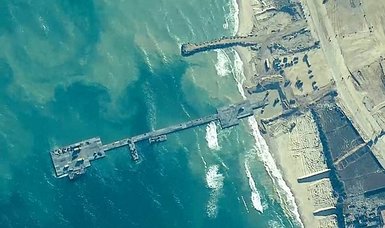 Aid trucks begin moving ashore via Gaza temporary pier: U.S.