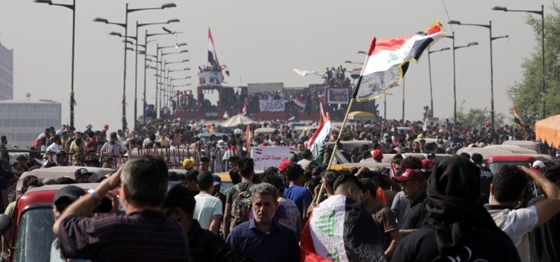 THOUSANDS RALLY IN IRAQ TO MARK ONE YEAR OF PROTESTS