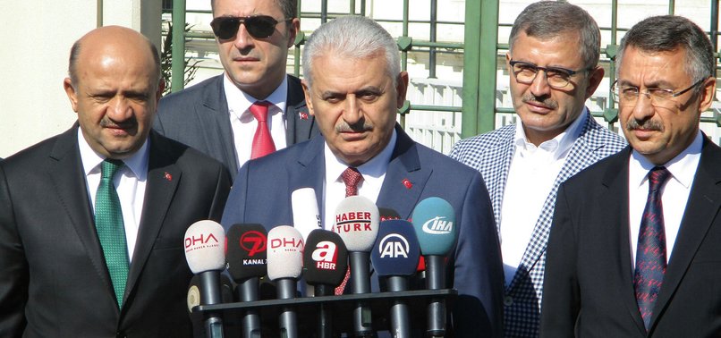 BANNER OF JAILED PKK LEADER ÖCALAN IN RAQQAH HARMS ALLIANCE WITH US, TURKISH PM SAYS