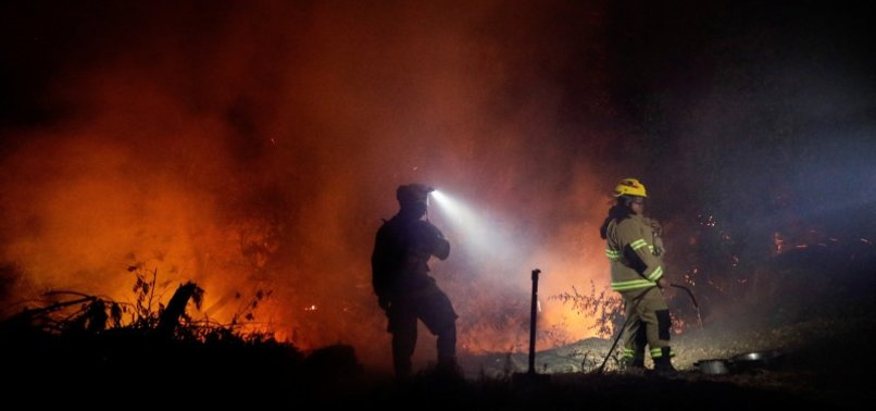 FOUR DEAD IN CHILE AS FIRES BLAZE THROUGH AREA SOUTH OF CAPITAL