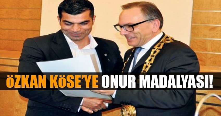 Özkan Köse’ye onur madalyası