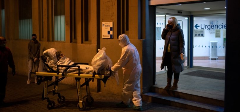 SPAIN REPORTS RECORD SINGLE-DAY CORONAVIRUS DEATHS