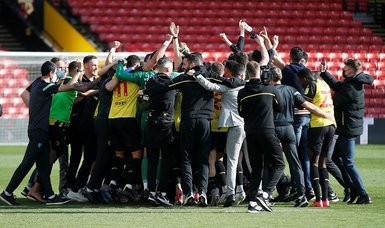 Watford seal Premier League promotion with victory over Millwall