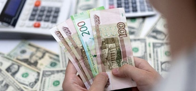 RUSSIAN ROUBLE SLIGHTLY WEAKER AGAINST THE US DOLLAR
