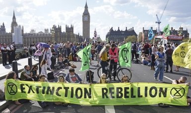Extinction Rebellion protests occupy bridges in London