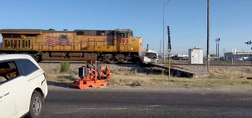 Freight train smashes vehicle on rails in Texas
