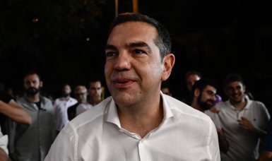 Greece's Tsipras says to step down as Syriza leader