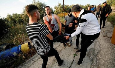 Israeli fire leaves Palestinian youth seriously injured in occupied West Bank