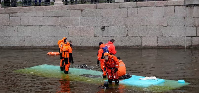THREE KILLED AS BUS CRASHES INTO RIVER IN RUSSIAS ST PETERSBURG
