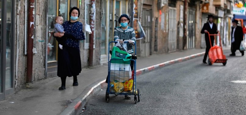 ISRAEL VIRUS CASES SURGE PAST 9,200, DEATH TOLL AT 65
