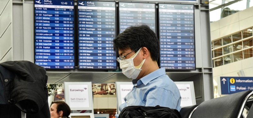 EU AGENCIES ADVISE DROPPING FACE MASK RULES FOR AIR TRAVEL