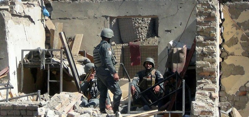 5 AFGHAN OFFICERS KILLED AS TALIBAN STORM POLICE HQ