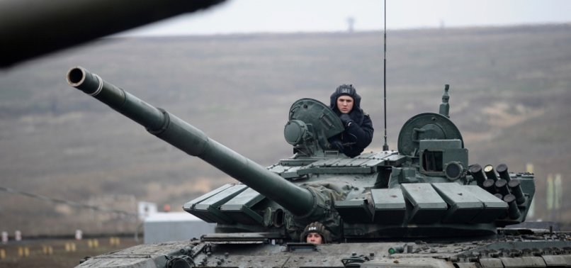 RUSSIA HOLDS LIVE-FIRE MILITARY DRILLS IN REGIONS NEAR UKRAINE - IFAX