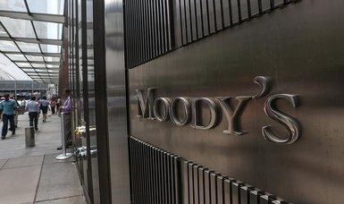 China disappointed with Moody's downgrading economic outlook