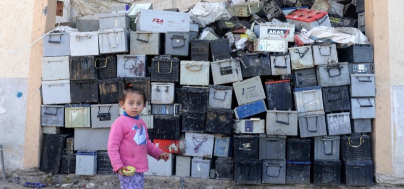 MOUNDS OF OLD BATTERIES THREATEN GAZA HEALTH