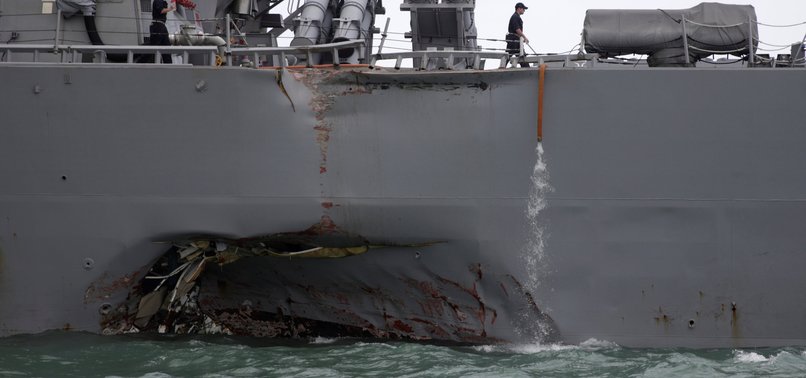 10 US SAILORS MISSING AFTER WARSHIP COLLIDES WITH TANKER NEAR SINGAPORE