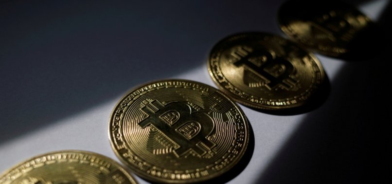 BITCOIN SLIPS ON PROFIT-TAKING BUT ON TRACK FOR BIGGEST GAIN IN 8 MONTHS