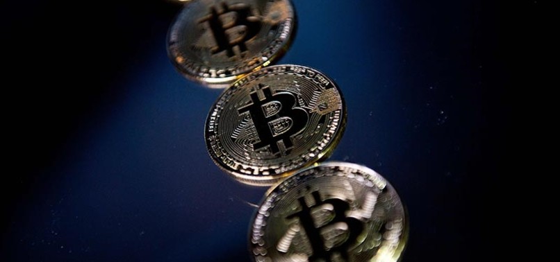 CRYPTOCURRENCY BITCOIN HITS NEW RECORD AT $11,850