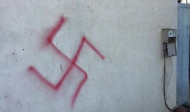 Swastikas daubed on building housing asylum-seekers in Germany