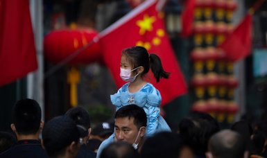 China imposes lockdowns as COVID-19 surges after holiday