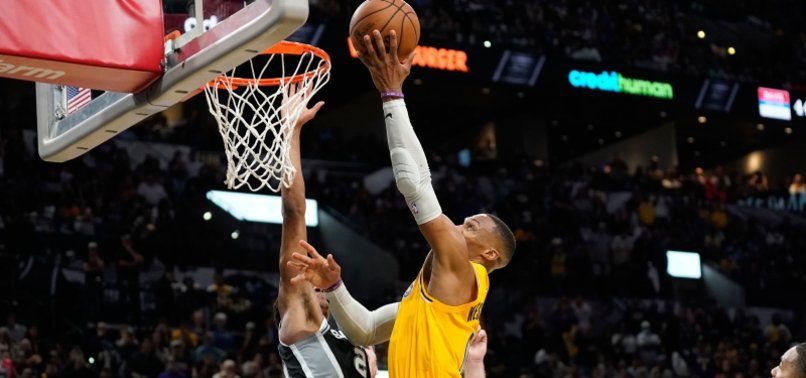 NBA ROUNDUP: LAKERS, WITHOUT LEBRON, EDGE SPURS IN OT