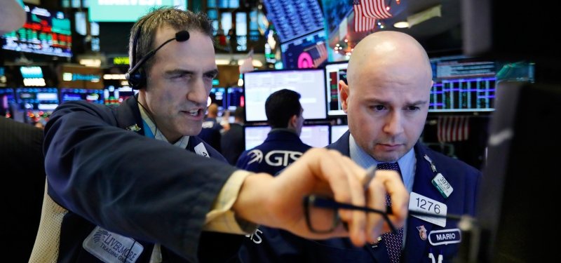 US stocks slip back as Dow falls 2.2 percent day after record gain