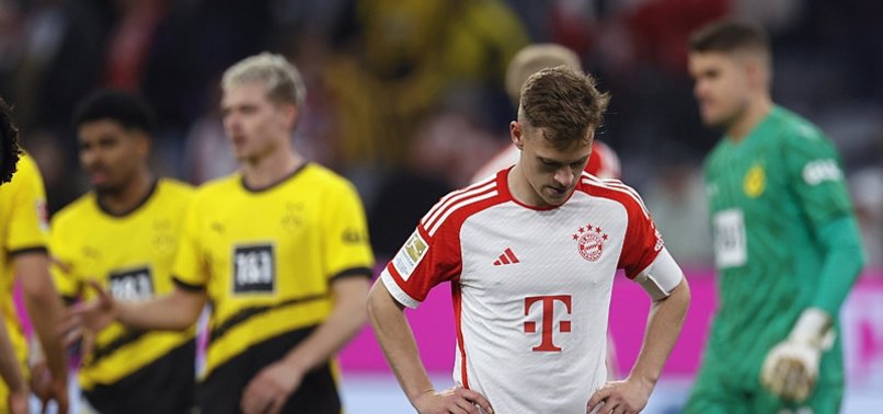BAYERN MUNICHS TITLE HOPES IN TATTERS AFTER 2-0 LOSS TO DORTMUND