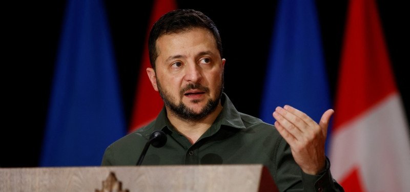 Ukraine's Zelenskiy stops over in Poland to award two volunteers