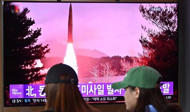 North Korea fires two ballistic missiles while leader Kim visits Russia