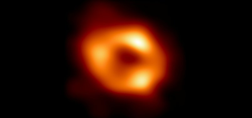 ASTRONOMERS PRESENT FIRST PICTURE OF BLACK HOLE AT CENTRE OF GALAXY