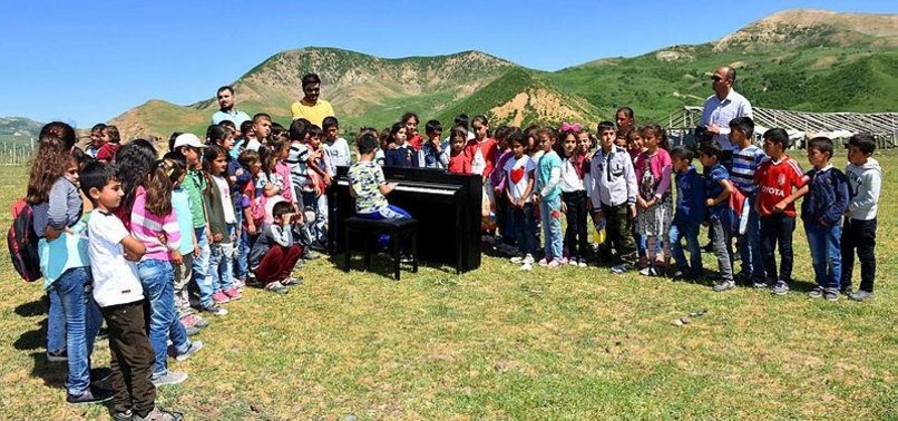 VISUALLY-IMPAIRED BOY GIVES PIANO CONCERT TO VILLAGE SCHOOL PEERS