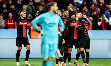 Leverkusen score again late to claim remarkable comeback win