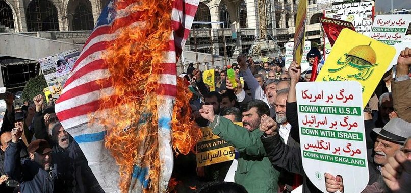 TRUMP PHOTOS, US FLAGS BURNED IN IRAN PROTESTS OVER JERUSALEM